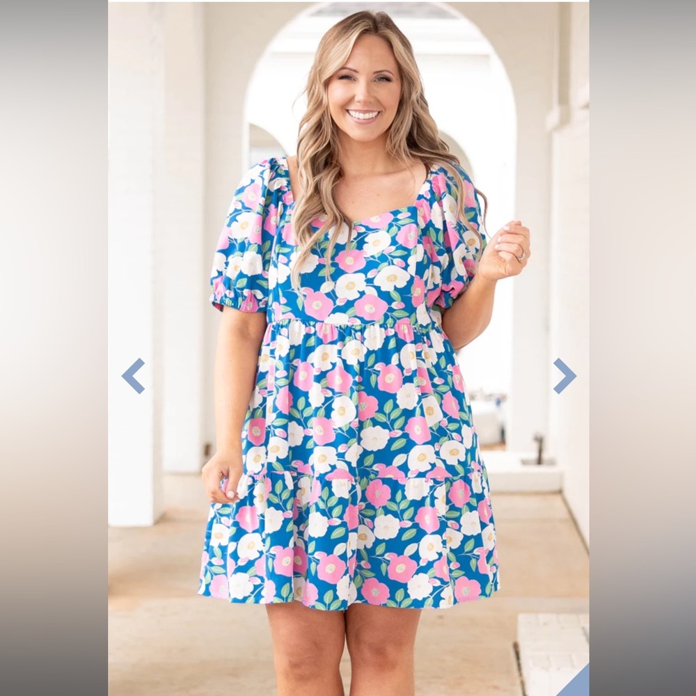 Beautiful blue color and floral pattern spring dress. Brand is Jodifil. Size 1XL